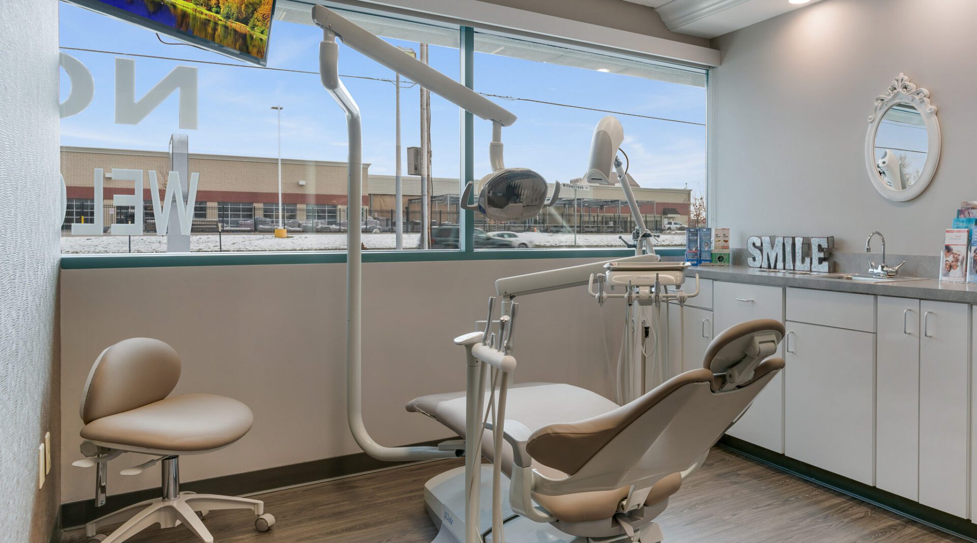 Dental exam room with large window.